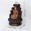 A table-top fountain featuring a statue of Lord Shiva, the Hindu god of destruction and transformation, often depicted with a trident and a snake around his neck. Water may be flowing around or from the statue, creating a peaceful or dramatic effect.