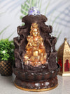 A table-top fountain featuring a statue of Lord Shiva, the Hindu god of destruction and transformation, often depicted with a trident and a snake around his neck. Water may be flowing around or from the statue, creating a peaceful or dramatic effect.