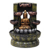 A resin table-top fountain featuring a statue of Lord Buddha, with water flowing around or from the statue.