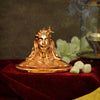 Handcrafted resin mini idol of Adiyogi with a copper finish, symbolizing knowledge and inspiration for yoga, perfect for home altars