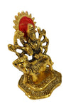 Handmade Goddess Durga idol sitting on a lion, crafted from metal with a golden finish, ideal for home decor, puja rooms, or car dashboards