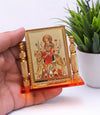 Handmade gold-plated photo frame featuring Maa Durga, crafted from durable wood, perfect for altars and home decor, symbolizing devotion and elegance