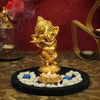 Handcrafted Ganesha gift set featuring a plastic idol, lotus-shaped tealight holder, stylish black tray, and decorative stones, perfect for altars."