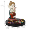 Handcrafted Ganesha home decor set featuring a polyresin idol, lotus-shaped tealight holder, and wooden tray, symbolizing prosperity and elegance."