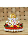 Handcrafted Ganesha idol made of durable polyresin, measuring 9 cm x 8 cm x 5 cm and weighing 300 grams, symbolizing wisdom and prosperity