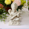 Handcrafted Saraswati idol made from polyresin mix marble power, embellished with goldwork, symbolizing wisdom and learning.