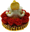 Handmade Ganesha showpiece idol crafted from polyresin, featuring intricate details, measuring 9 cm x 9 cm x 9 cm, ideal for altars and car dashboards