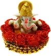 Handmade Ganesha showpiece idol crafted from polyresin, featuring intricate details, measuring 9 cm x 9 cm x 9 cm, ideal for altars and car dashboards