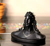 Handcrafted Lord Adiyogi Shiva idol in meditative posture, made from durable resin, ideal for home altars and spiritual decor.