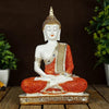 A beautifully crafted Lord Buddha statue made of high-quality polyresin, showcasing intricate details and a serene expression, symbolizing tranquility and wisdom