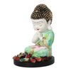 Serene polyresin statue of a young monk in deep contemplation, featuring soft green and white hues, with a natural wood base and tealight holder.