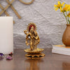 Handcrafted metal statue of Radha Krishna playing the flute, featuring a gold finish, symbolizing divine love and harmony.