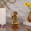 Handcrafted metal statue of Radha Krishna playing the flute, featuring a gold finish, symbolizing divine love and harmony.