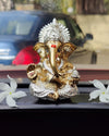 Compact resin Ganesha idol for car dashboard, 5.1x5.1x8.9 cm, 300g, symbolizing spiritual protection and blessings. Perfect for travel and Hindu faith gifting.