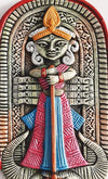 Handcrafted terracotta wall hanging of Goddess Durga, showcasing intricate details and rustic elegance, symbolizing protection and spirituality